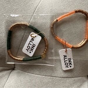 Ink & Alloy set of 2 bracelets
One Gold & Dark Green
Other Gold & Peach
